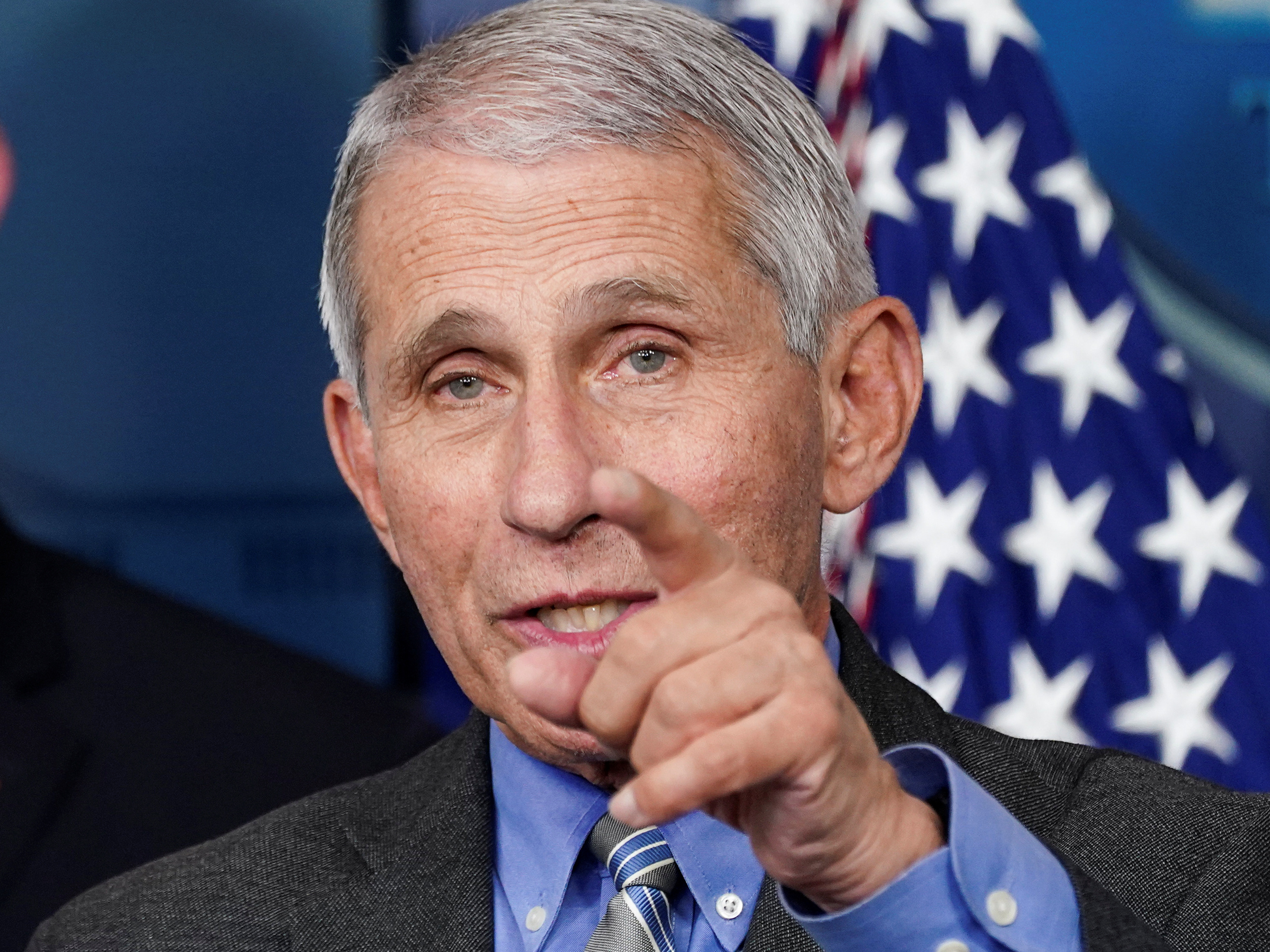 caption: "I think the American public have done a really terrific job of just buckling down and doing those physical separation and adhering to those guidelines," National Institute of Allergy and Infectious Diseases Director Dr. Anthony Fauci said Thursday.