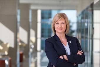 caption: LouAnn Woodward, who leads the University of Mississippi Medical Center, supports a statewide mask mandate. But she says state leaders are "in a pickle," based on medical advice against popular opposition.