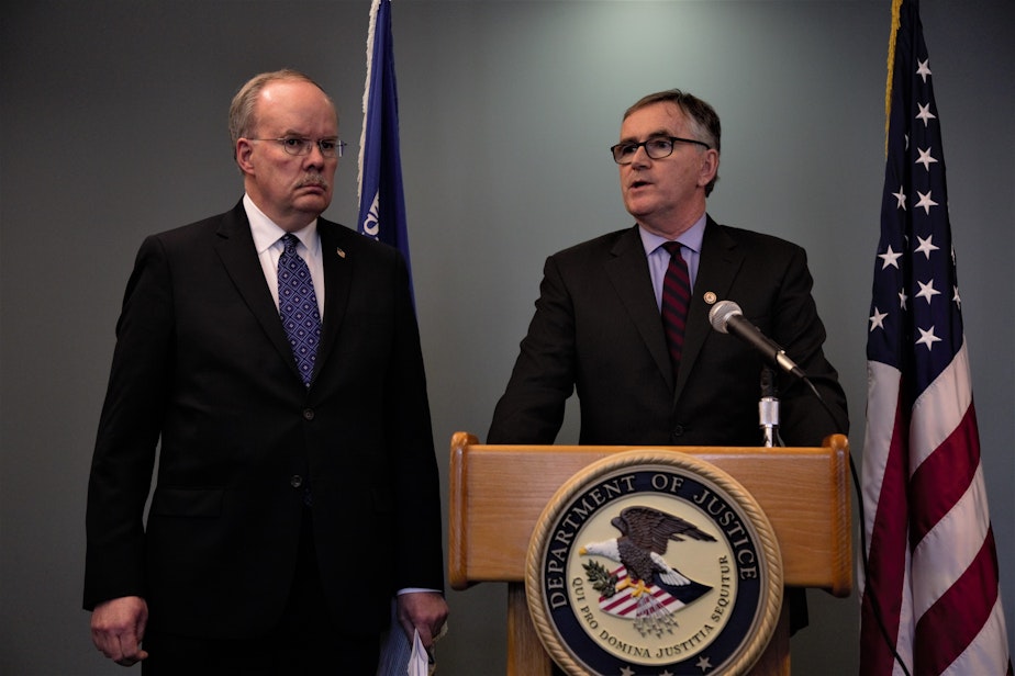 caption: U.S. Attorneys William D. Hyslop and Brian T. Moran share the details of a Department of Justice lawsuit against King County in Seattle on Feb. 10, 2020. The lawsuit is over the county's ban on ICE flights from Boeing Field. 