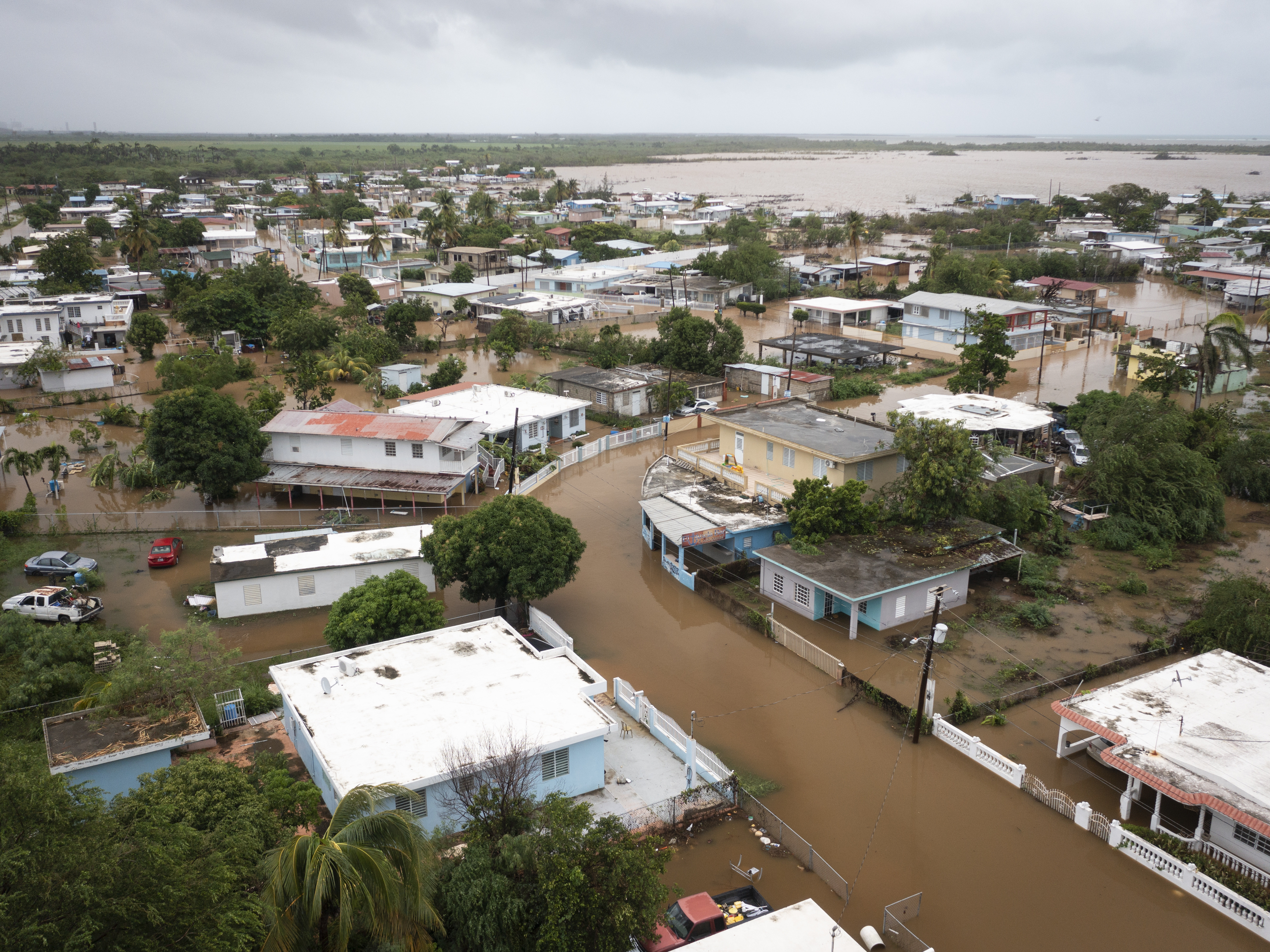 caption: Playa Salinas is flooded after the passing of Hurricane Fiona in Salinas, Puerto Rico, on Monday.
