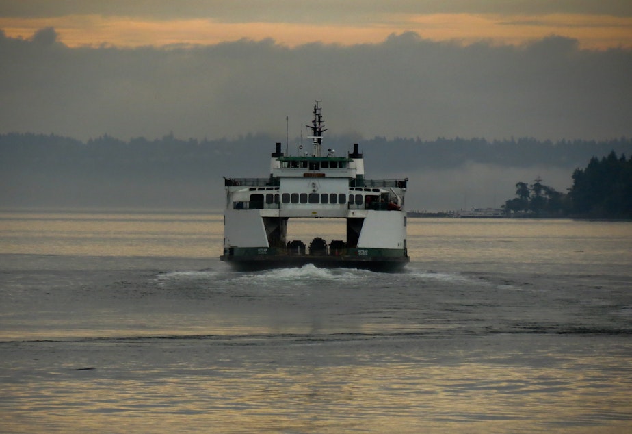 caption: A ferry traveling near Bainbridge Island.