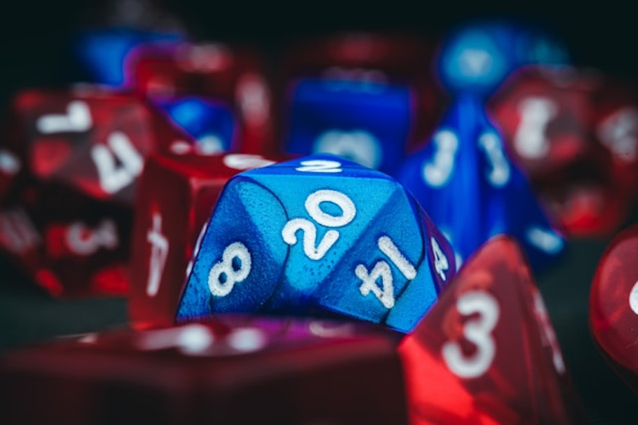 caption: Tabletop game dice, commonly used in Dungeons and Dragons and other role-playing games. With a donation from Wizards of the Coast, Washington's Secretary of State's Office is sending 75 free D&D kits to libraries across the state, along with the potential for game-playing grants. 