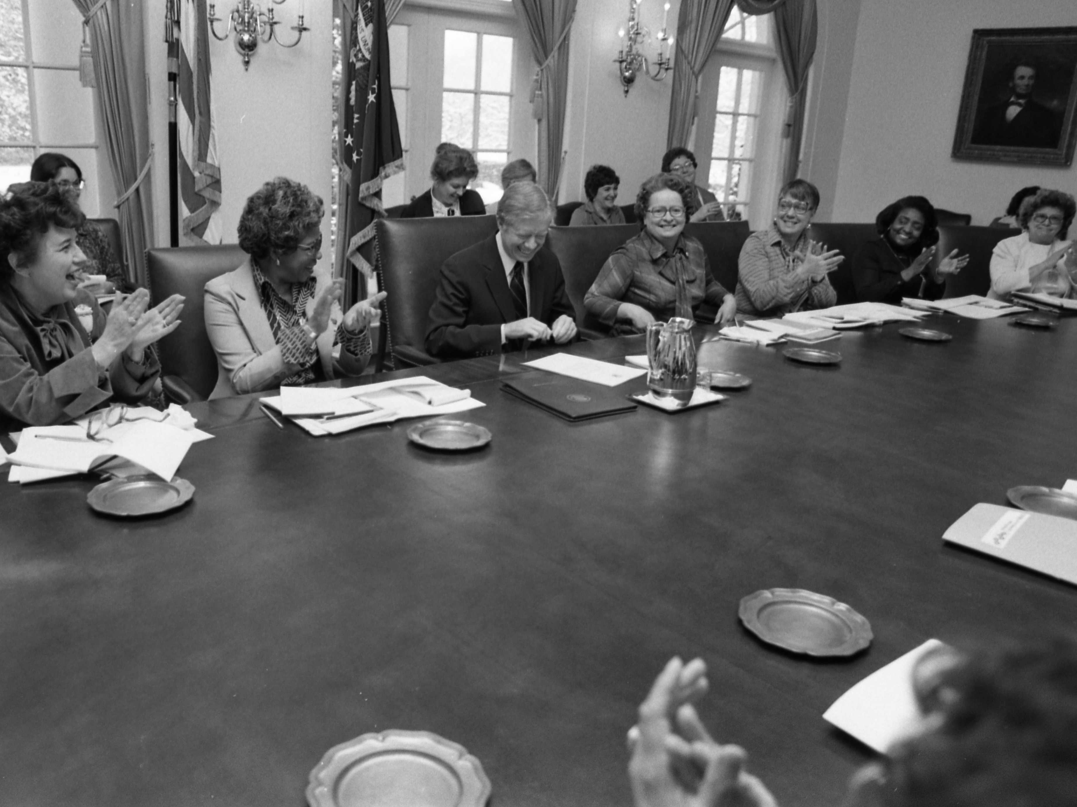 caption: President Jimmy Carter signs a proclamation designating March 2-8, 1980, as the first national Women's History Week.