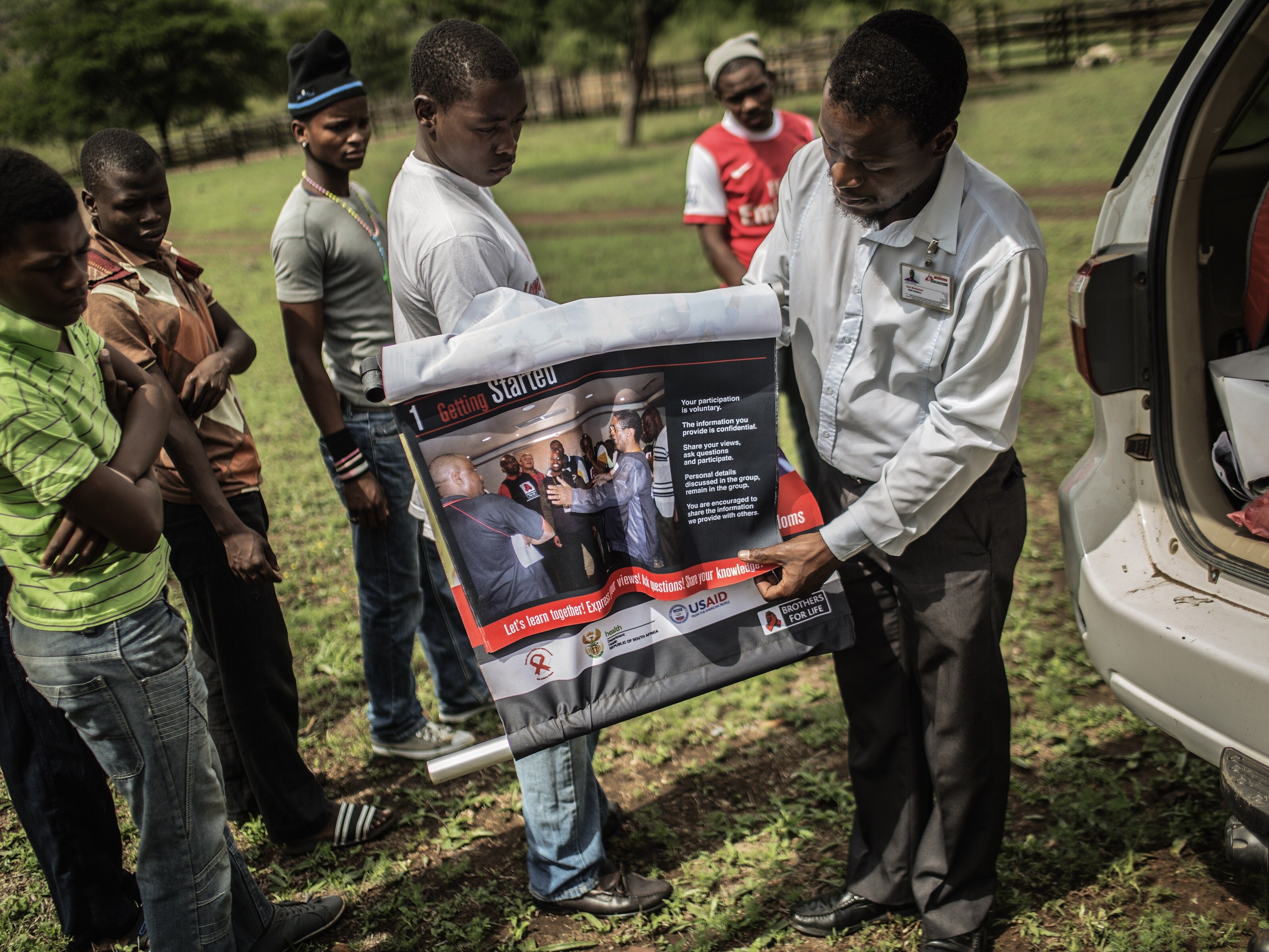 caption: South African boys from a rural area are briefed by an health worker from Doctors Without Borders before undergoing medical circumcision as a form of HIV prevention. The U.S. has supported male circumcision programs in countries with high rates of HIV. In his address to Congress this week, President Donald Trump listed aid programs that he considers an "appalling waste" and included "$10 million for male circumcision in Mozambique."