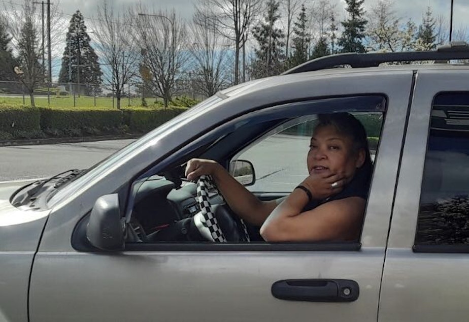 caption: Carey Purnell is a restaurant delivery driver in the Seattle area for Uber Eats. She's also homeless.