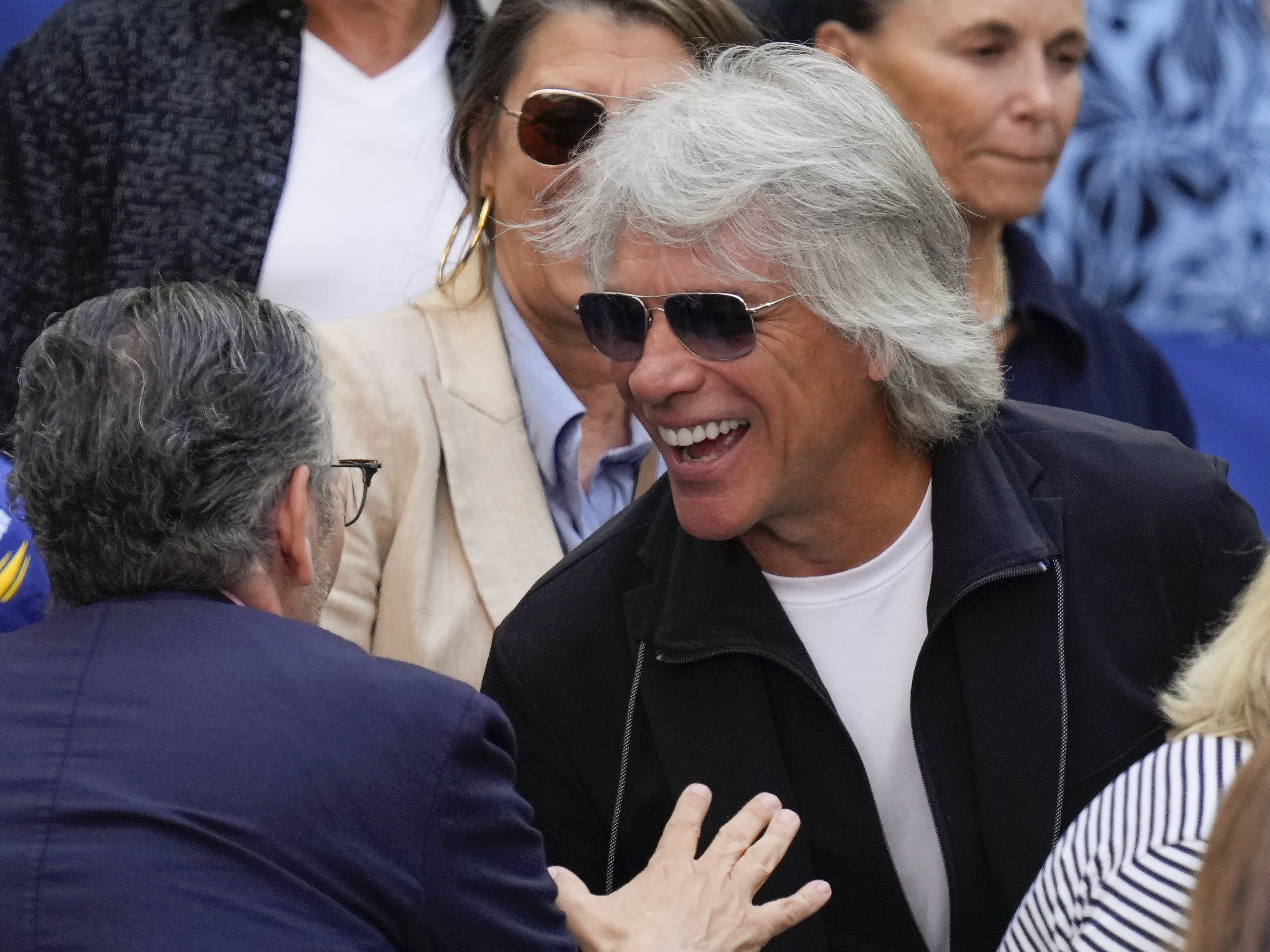 caption: Jon Bon Jovi, pictured at the U.S. Open tennis championships in New York on Sunday, is credited with helping save a woman's life on a Nashville bridge just days later. 
