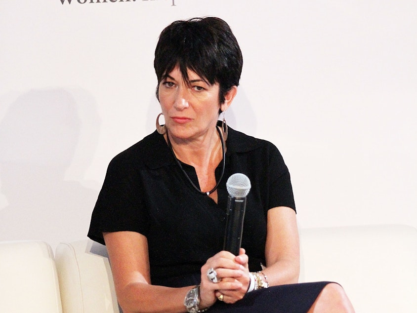 caption: Ghislaine Maxwell, shown here in 2013, is facing trial on accusations of sex trafficking.