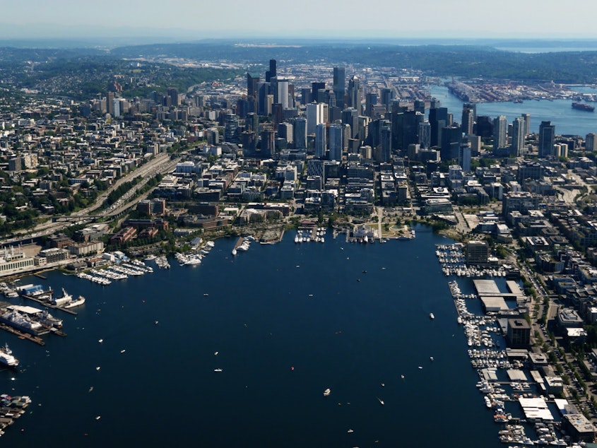 caption: The view of the Seattle skyline across Lake Union.