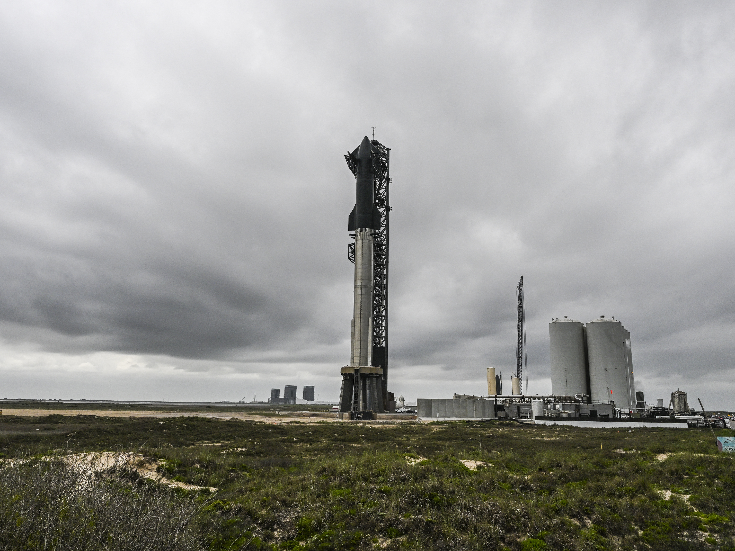 caption: The SpaceX Starship is seen as it stands on the launch pad ahead of its third flight test from Starbase in Boca Chica, Texas on March 12, 2024.