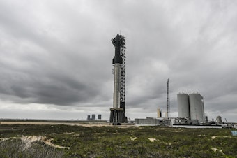 caption: The SpaceX Starship is seen as it stands on the launch pad ahead of its third flight test from Starbase in Boca Chica, Texas on March 12, 2024.