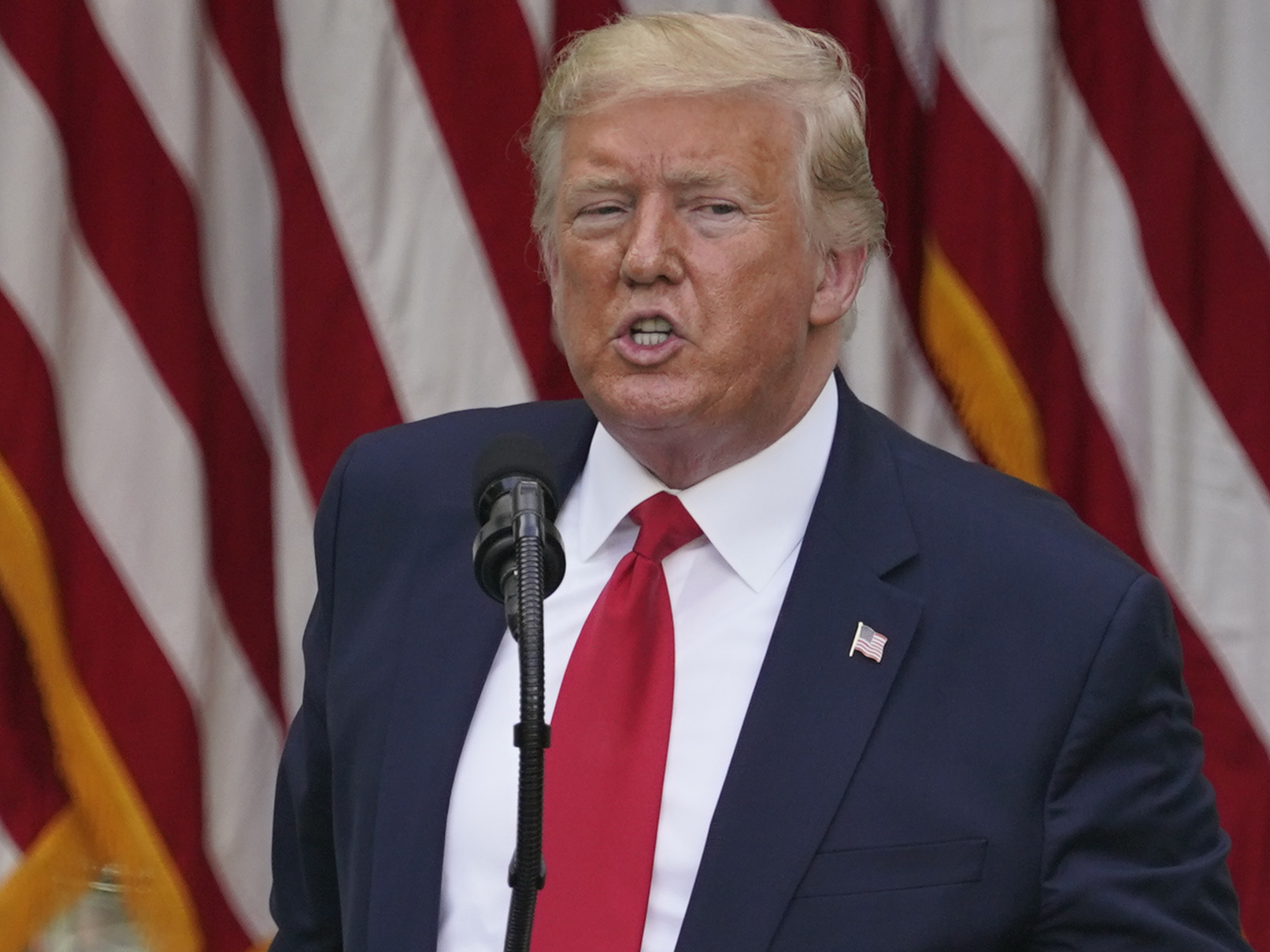 caption: President Trump's latest confrontation with Twitter was set off after the tech company placed fact-checking warnings on two of his tweets.