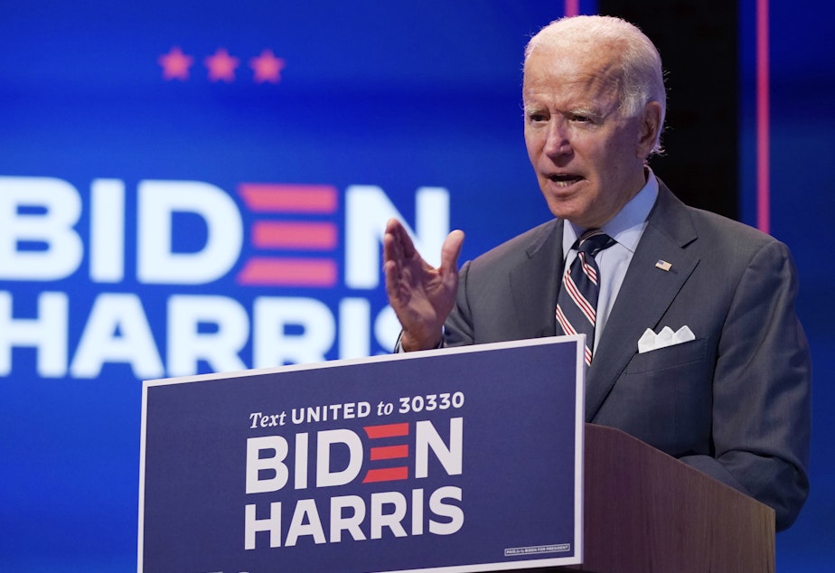 caption: Democratic presidential nominee Joe Biden speaks about coronavirus vaccines after a briefing with public health experts in Wilmington, Del., on Wednesday.