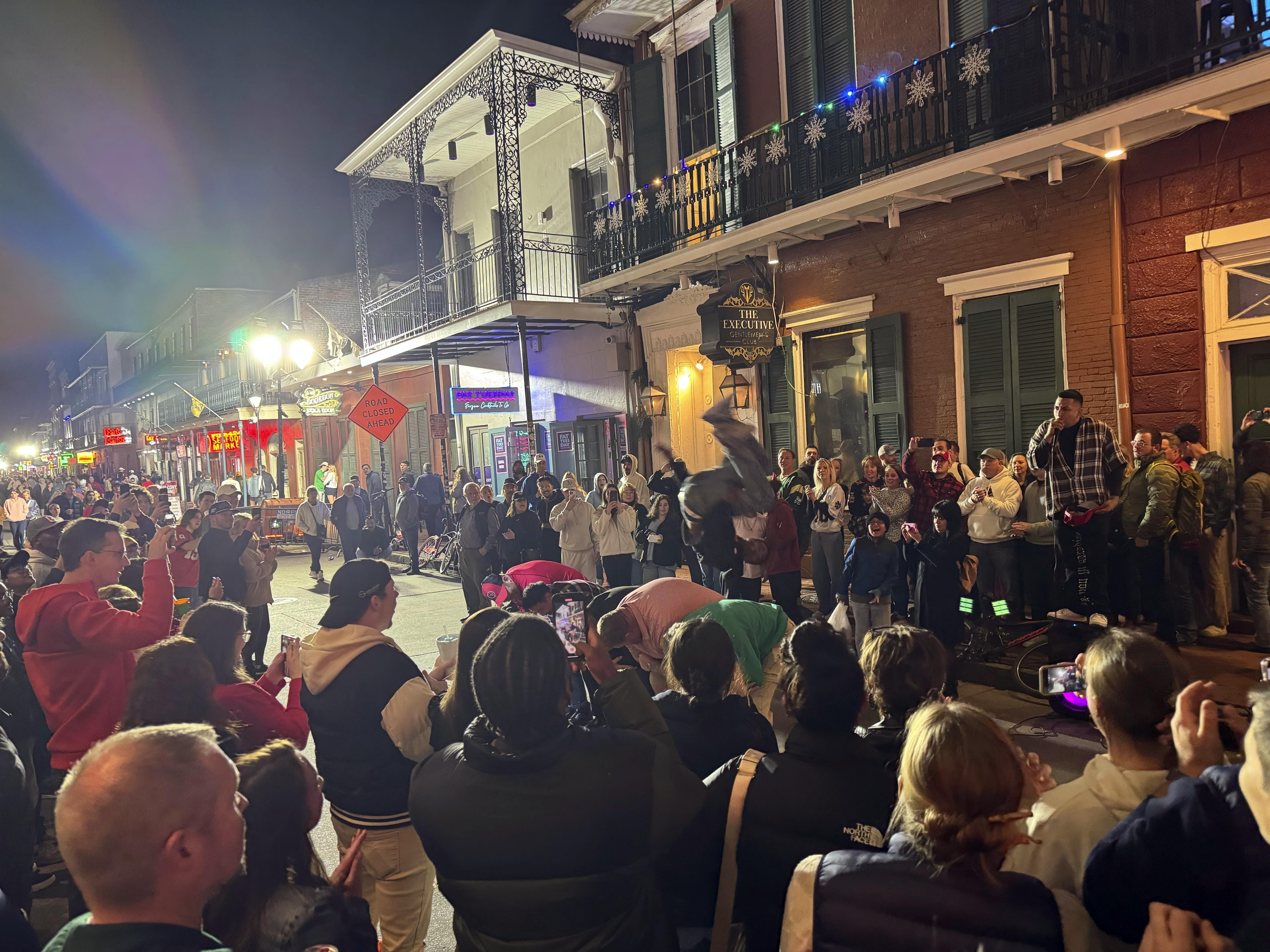 caption: Crowds return to a reopened Bourbon Street on Jan. 2, 2025, the day after the deadly truck attack in New Orleans.