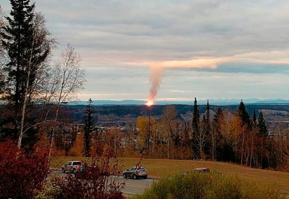 caption: This Tuesday, Oct. 9, 2018, photo provided by Dhruv Desai shows an explosion near the community of Shelley, British Columbia. 