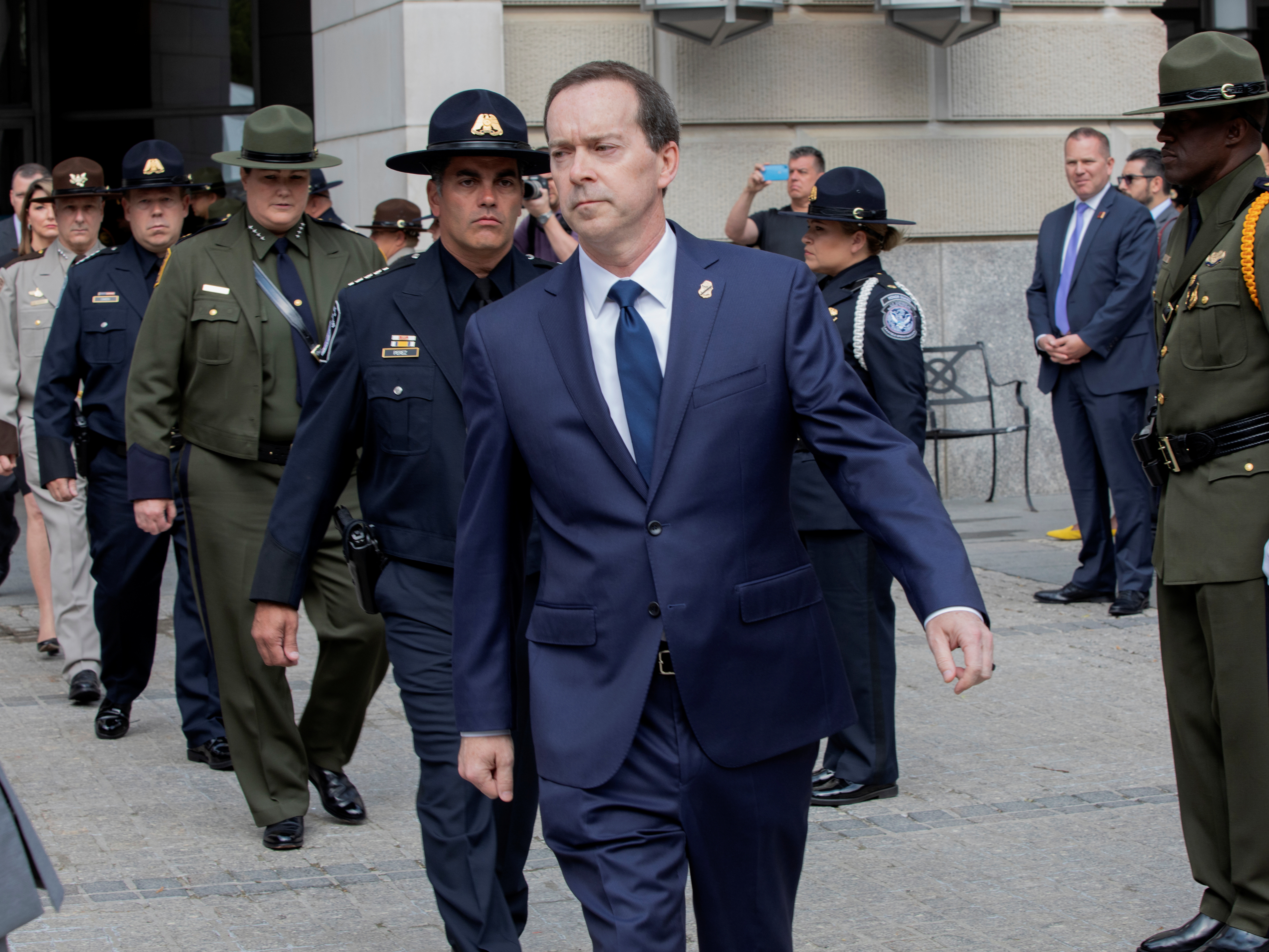 caption: John Sanders (center) has been acting commissioner of U.S. Customs and Border Protection for just over two months.