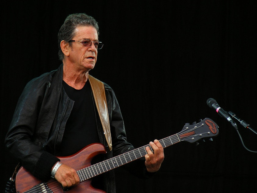 caption: Rock legend Lou Reed performing in 2011.