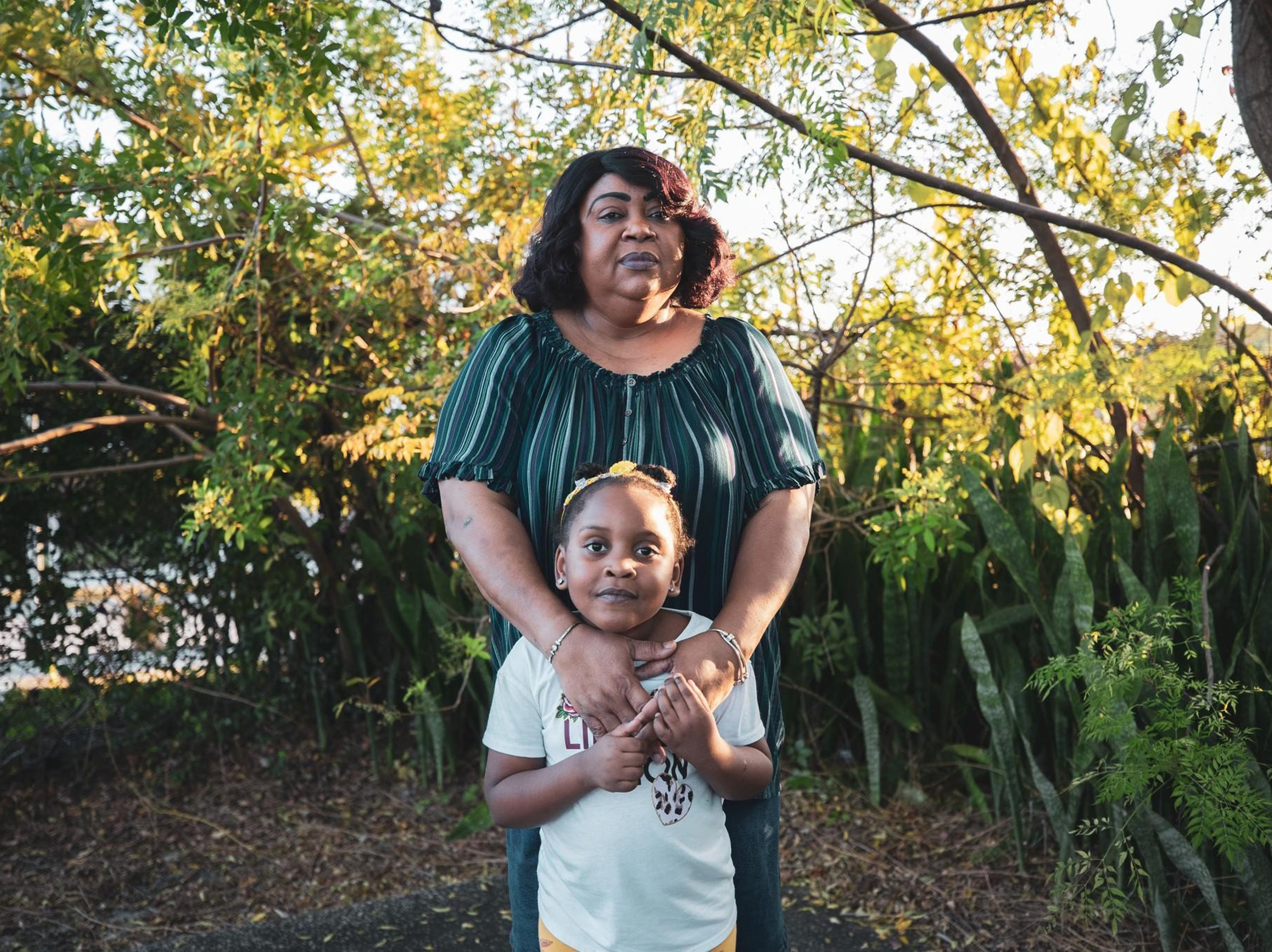 caption: Meralyn Kirkland with her granddaughter, Kaia Rolle.