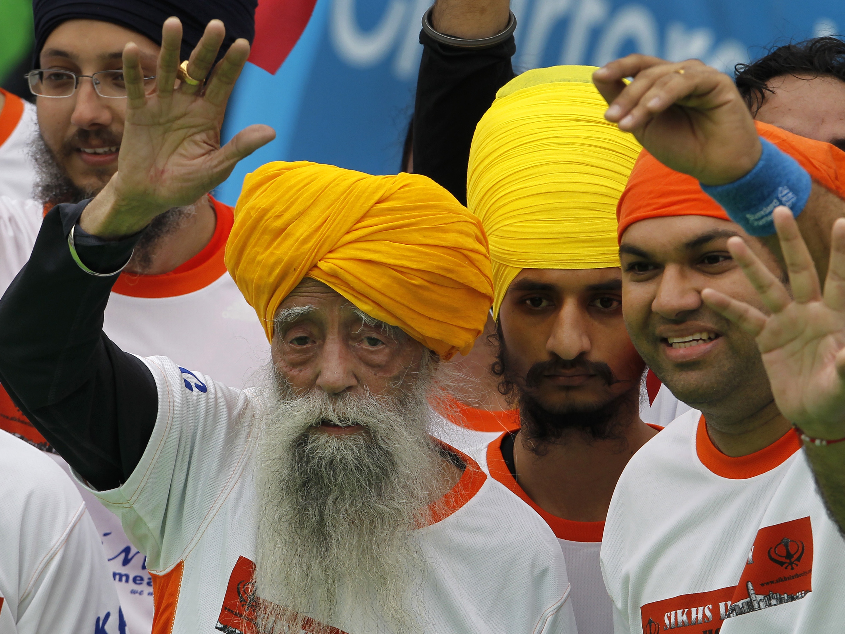 caption: Centenarian marathon runner Fauja Singh.