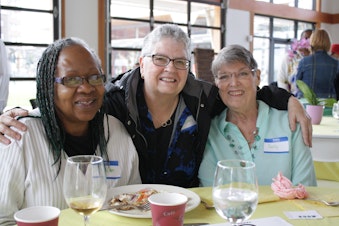caption: These three women are among hundreds of seniors moving to Tukwila International Boulevard, a stretch of the former highway 99 once known for crime and prostitution.