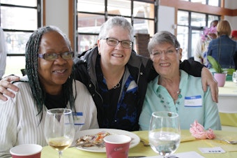 caption: These three women are among hundreds of seniors moving to Tukwila International Boulevard, a stretch of the former highway 99 once known for crime and prostitution.
