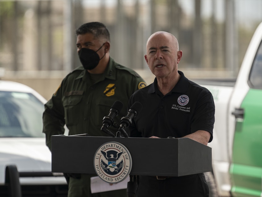 caption: The head of Homeland Security, Alejandro Mayorkas, says U.S. authorities encountered migrants more than 212,000 on the U.S.-Mexico border in July — an "unprecedented number."