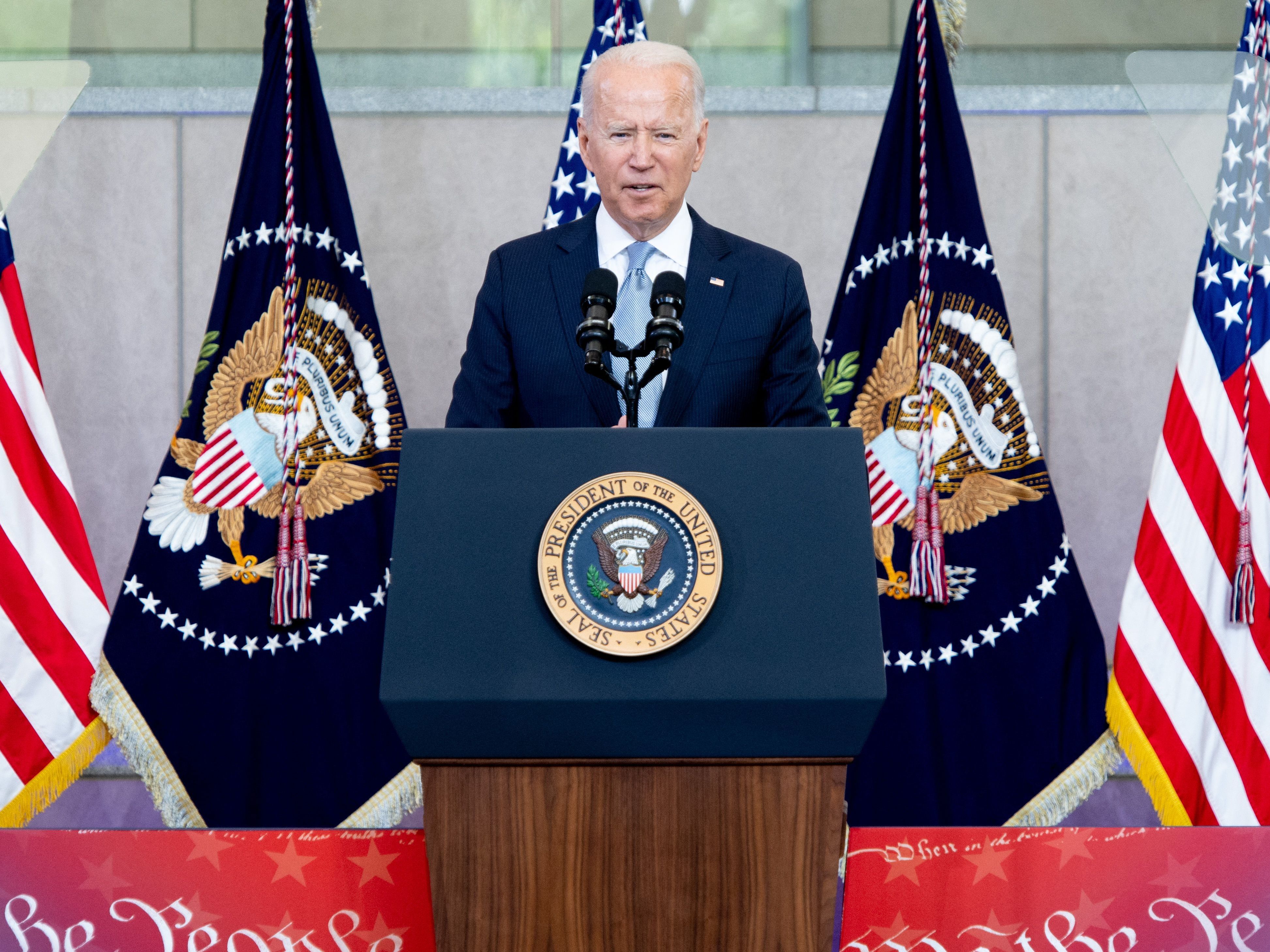 caption: President Biden speaks about voting rights at the National Constitution Center in Philadelphia on Tuesday.