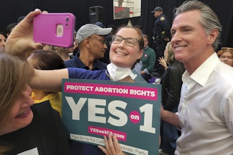 caption: In a file photo from Nov. 6, 2022, California Gov. Gavin Newsom appears at a rally in support of Proposition 1, a state constitutional amendment to guarantee the right to abortion and contraception.
