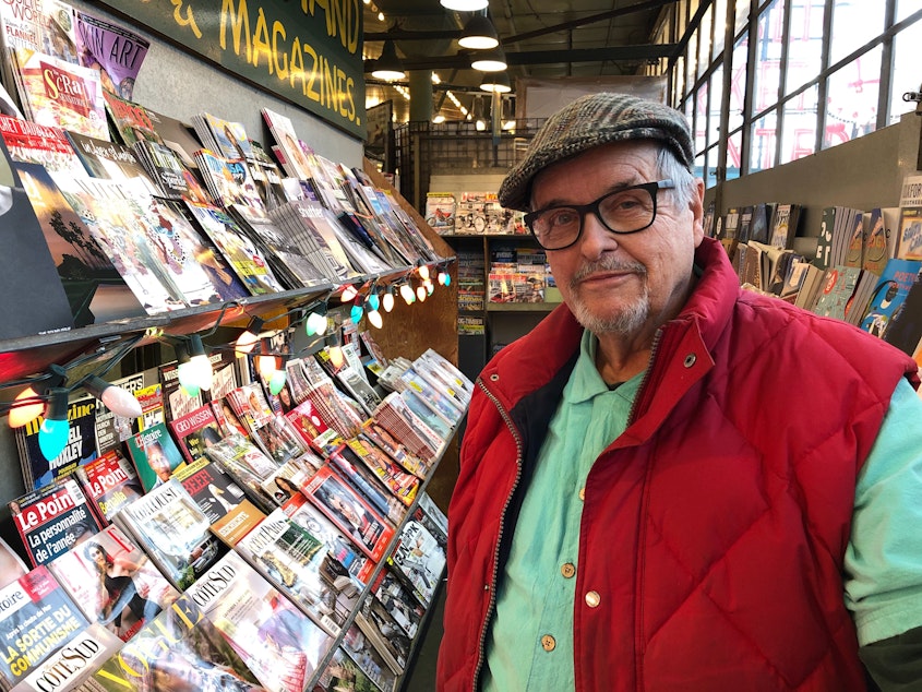 caption: Lee Laukhart, owner of First and Pike News at the Pike Place Market, is shuttering his business after 40 years.