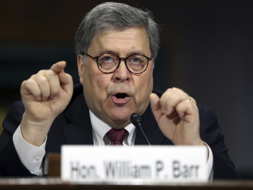 caption: Attorney General William Barr testifies during a Senate Judiciary Committee hearing in May 2019. An investigation Barr initiated into the origins of the Russia probe likely will continue into the new administration.