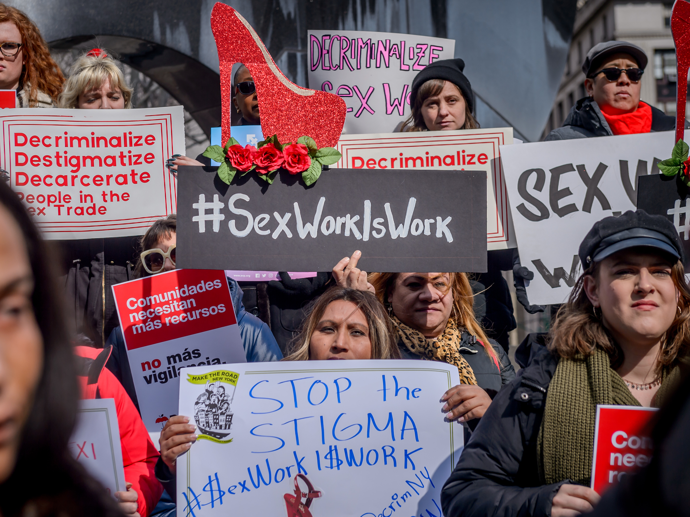 caption: Protesters gather in New York City in February 2019 to advocate for the decriminalization of sex trades in the city and state. The Manhattan District Attorney's Office announced more than two years later it would stop prosecuting prostitution and seek the dismissal of hundreds of related cases dating back decades.