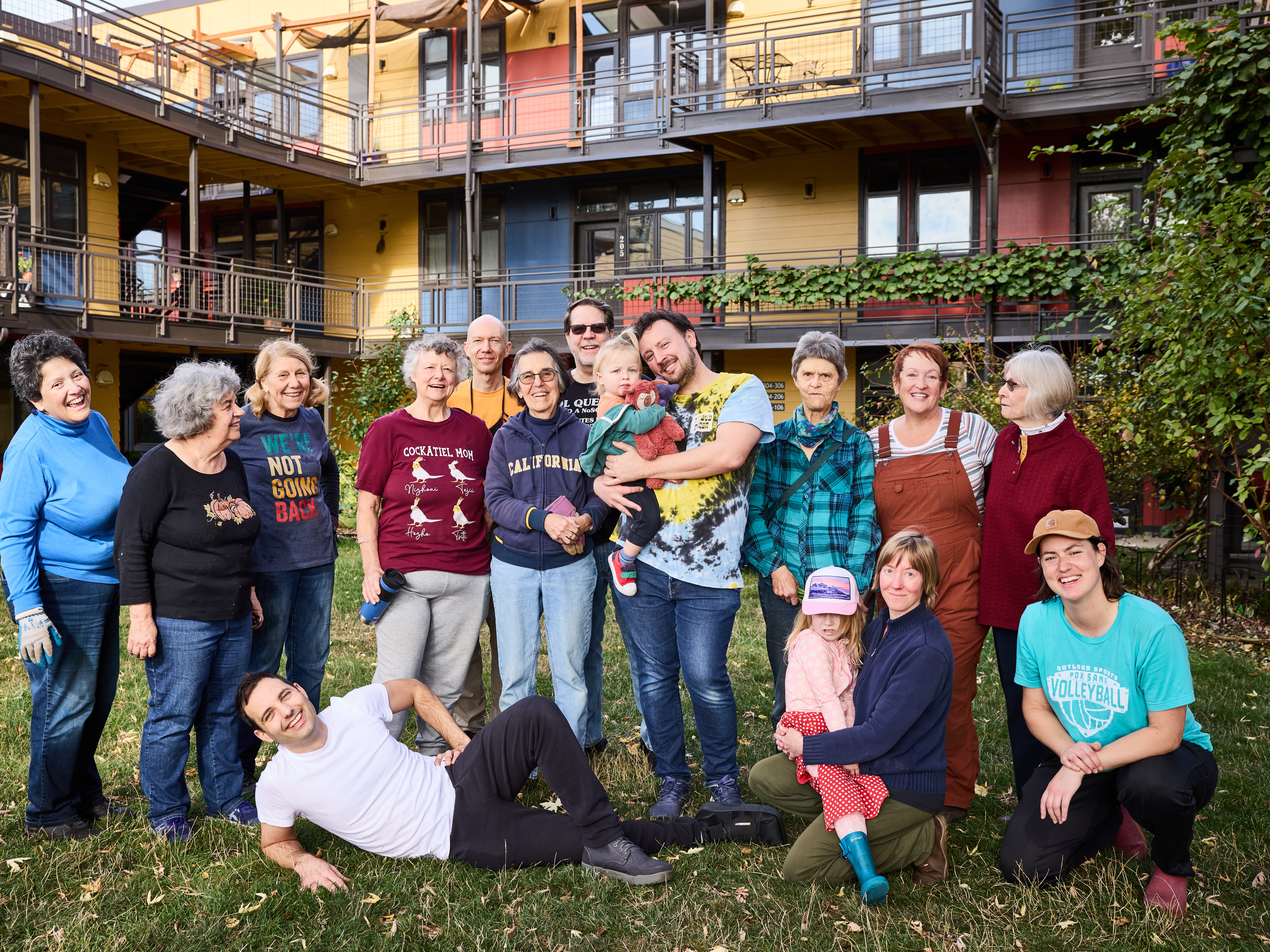 caption: Residents of Daybreak Cohousing in Portland, Oregon, gather in their shared courtyard. It's one of about 200 cohousing communities in the country.
