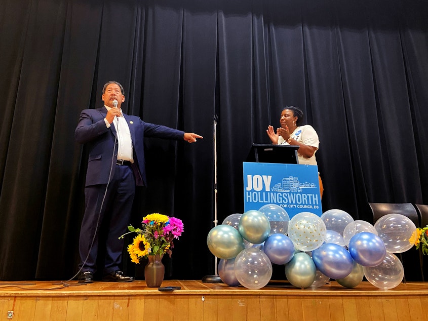 caption: Seattle mayor Bruce Harrell introduces Joy Hollingsworth, Seattle city council candidate representing the 3rd district, on Tuesday, August 1, 2023, during an election night party at the MLK FAME Community Center in Seattle. 