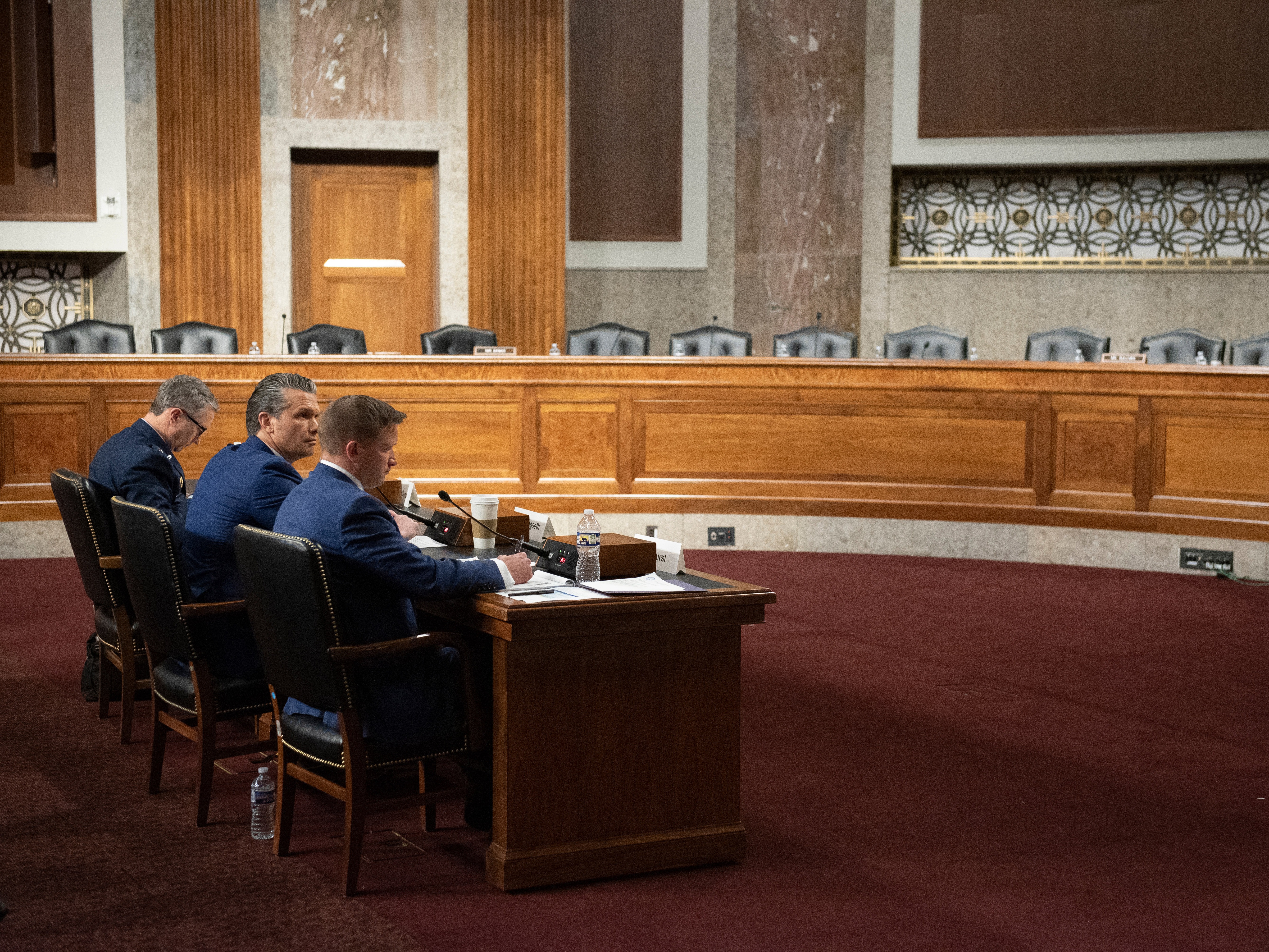 caption: From l-r., Chairman of the Joint Chiefs of Staff Air Force Gen. Danial Caine, Secretary of Defense Pete Hegseth, and acting undersecretary of defense during the Senate Armed Services Committee hearing on the Department of Defense budget, on Capitol Hill, in Washington, Thursday, April 30, 2026.