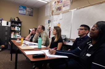 caption: A panel at Garfield High School on Monday discusses the NAACP's proposal to require ethnic studies.