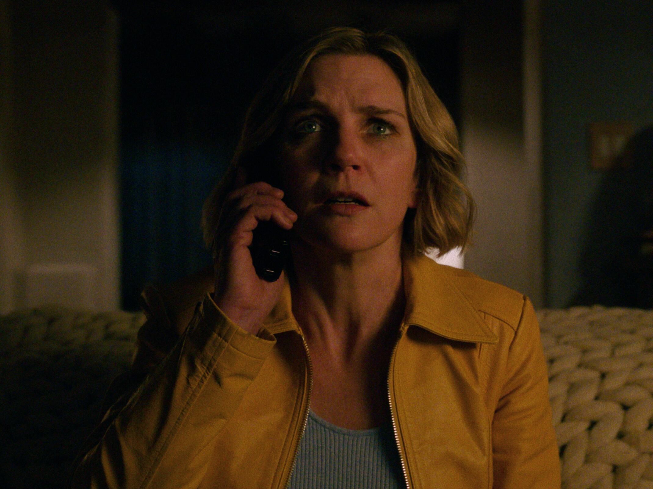 caption: Rhea Seehorn plays a misanthropic romance writer in the Apple TV series <em>Pluribus</em>.