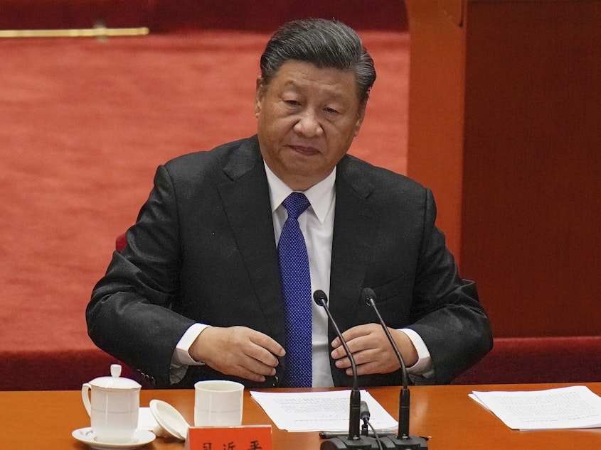 caption: Chinese leader Xi Jinping said on Saturday that reunification with Taiwan must happen and will happen peacefully.