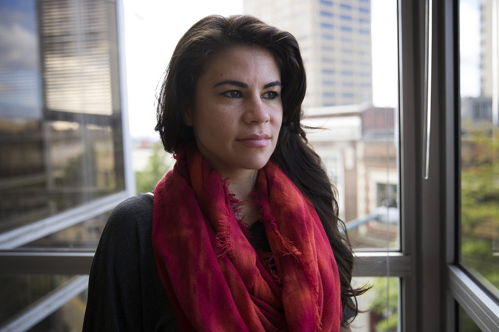 caption: Fernmarie Rodriguez at the KUOW studios.