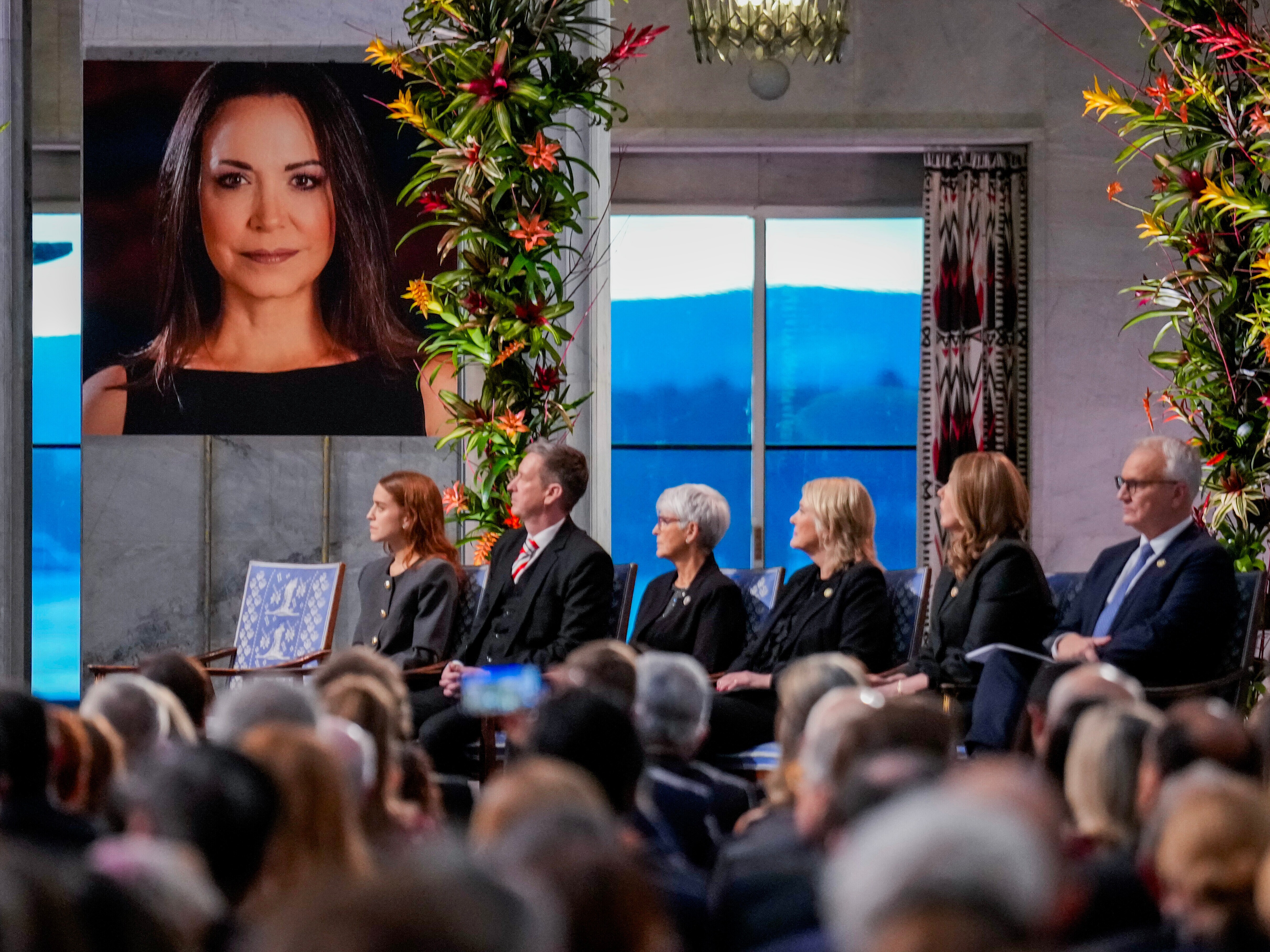 caption: A picture of Nobel Peace Prize laureate Maria Corina Machado during the Nobel Peace Prize award ceremony at Oslo City Hall, in Oslo, Norway, Wednesday Dec. 10, 2025.