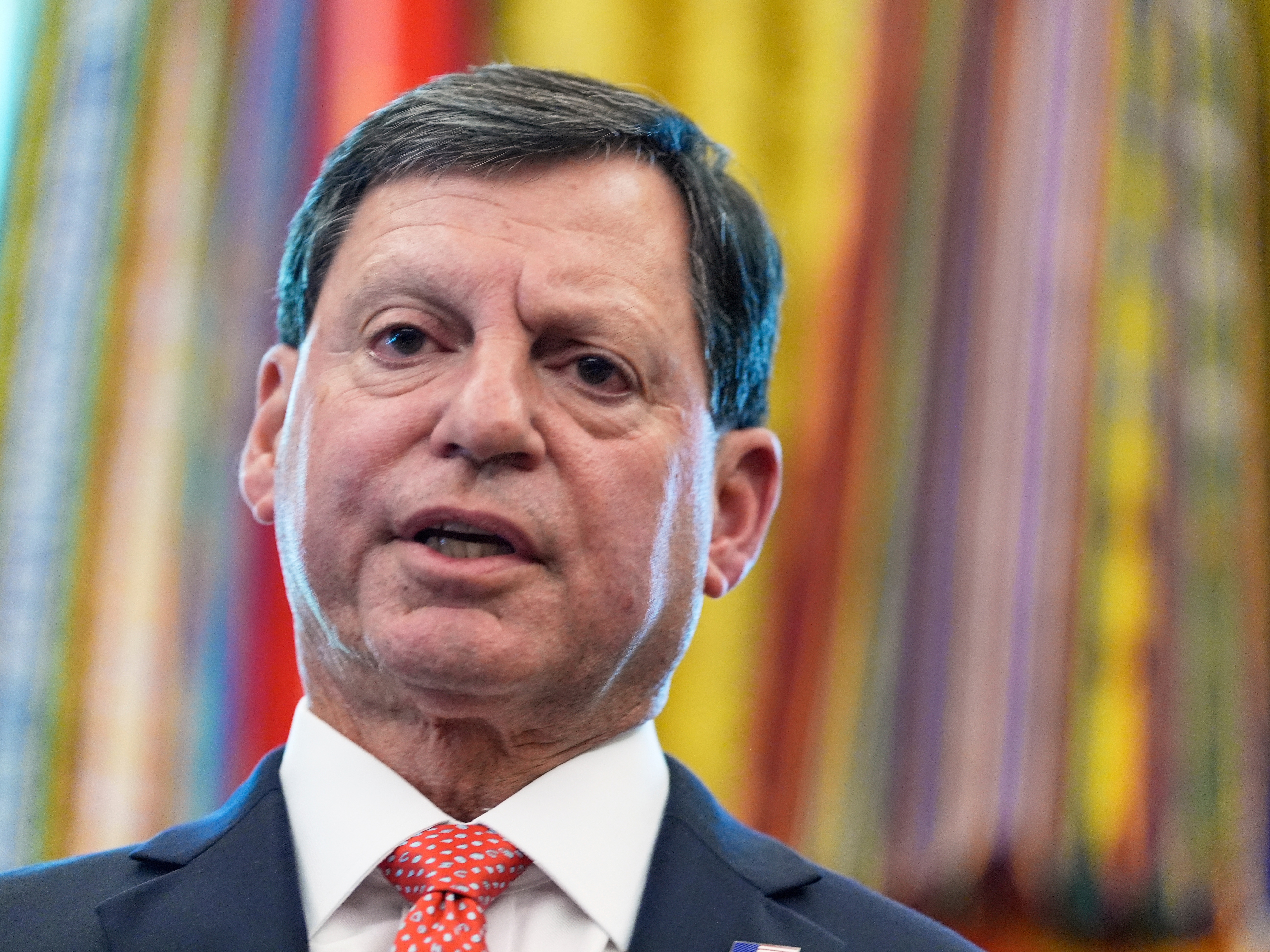 caption: Social Security Commissioner Frank Bisignano speaks during an event in the Oval Office to mark the 90th anniversary of the Social Security Act, Aug. 14, 2025, in Washington.