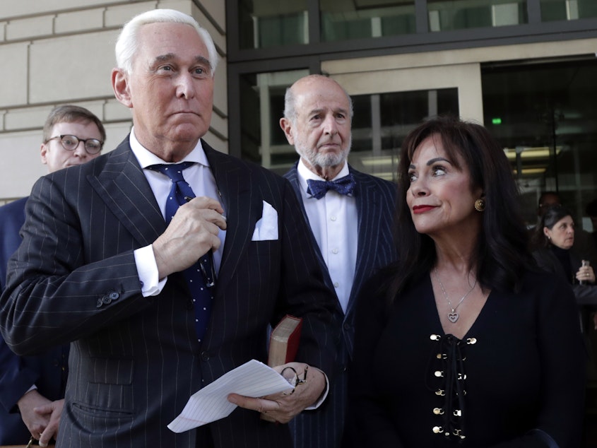 caption: Roger Stone leaves federal court with his wife, Nydia Stone, on the day he was found guilty last fall.
