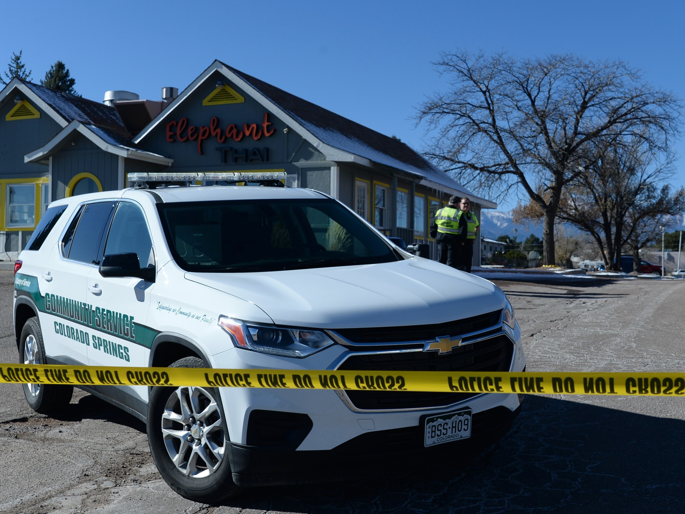 caption: A Colorado Springs community service vehicle is parked Sunday near a gay nightclub in Colorado Springs, Colo., where a shooting occurred late Saturday night.