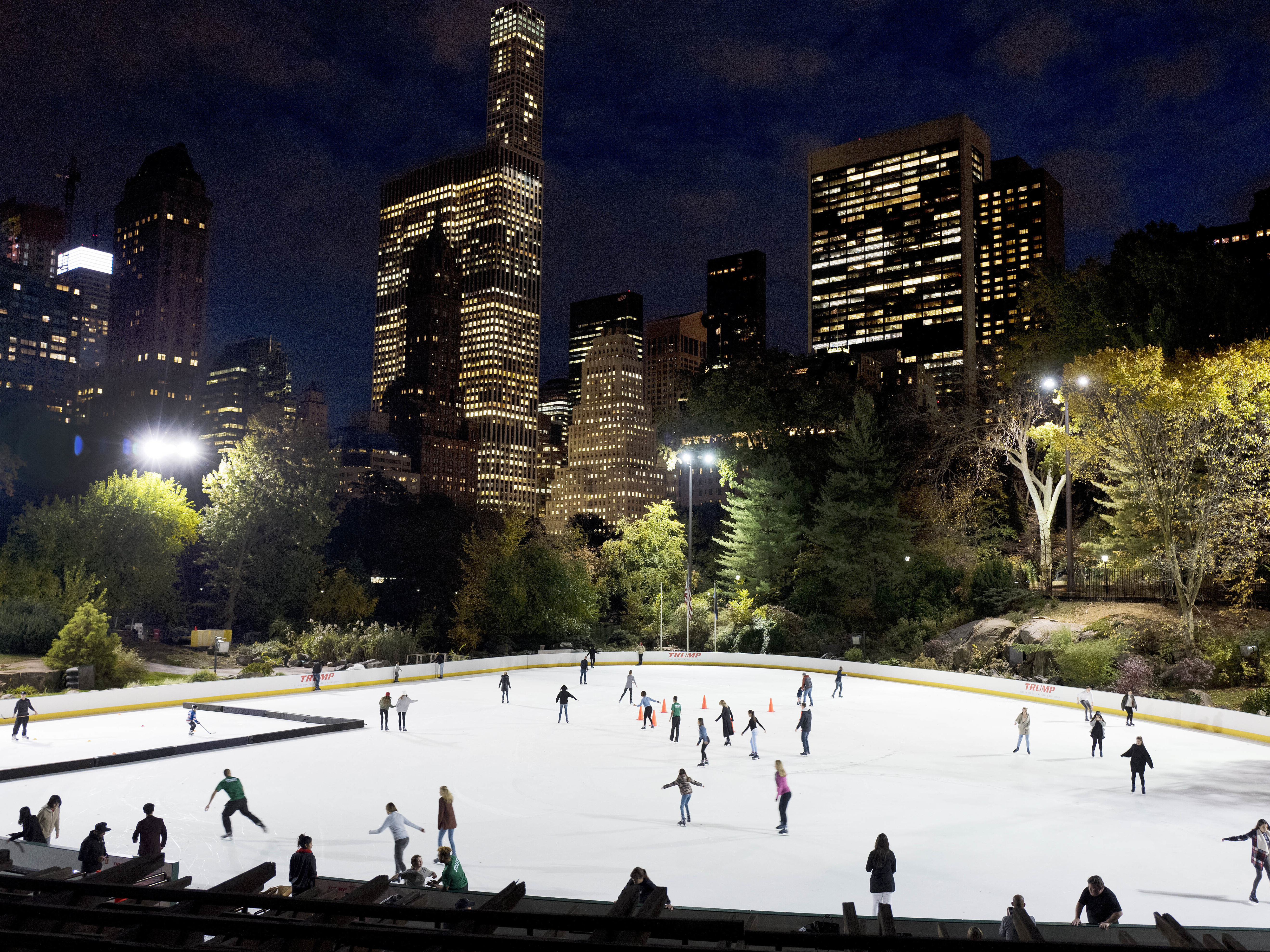 caption: The Wollman Ice Rink in New York City's Central Park, operated by the Trump Organization, in  a 2016 photo. Mayor Bill de Blasio is examining whether the city's contract with the Trump Organization can be canceled.