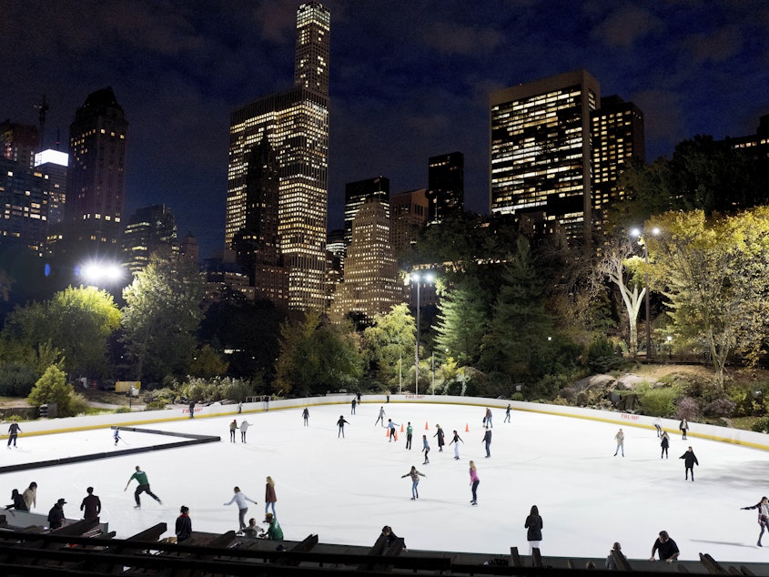 caption: The Wollman Ice Rink in New York City's Central Park, operated by the Trump Organization, in  a 2016 photo. Mayor Bill de Blasio is examining whether the city's contract with the Trump Organization can be canceled.