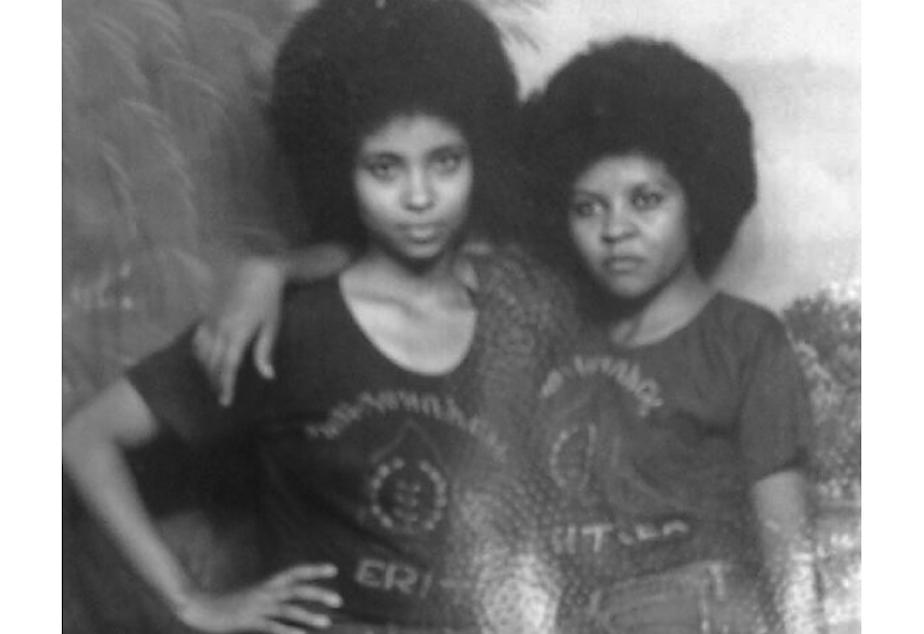 Akberet Asfaha (right) poses with her best friend and fellow soldier, Amna Mohammad. Akberet left home at age 16 without her parents' permission to fight in the Eritrean War of Independence.