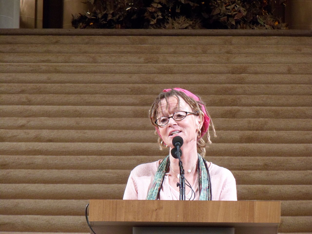 caption: Author Anne Lammott at the lighting ceremony for the Rainbow World Fund's World Tree of Hope on Dec. 10, 2013 at San Francisco City Hall