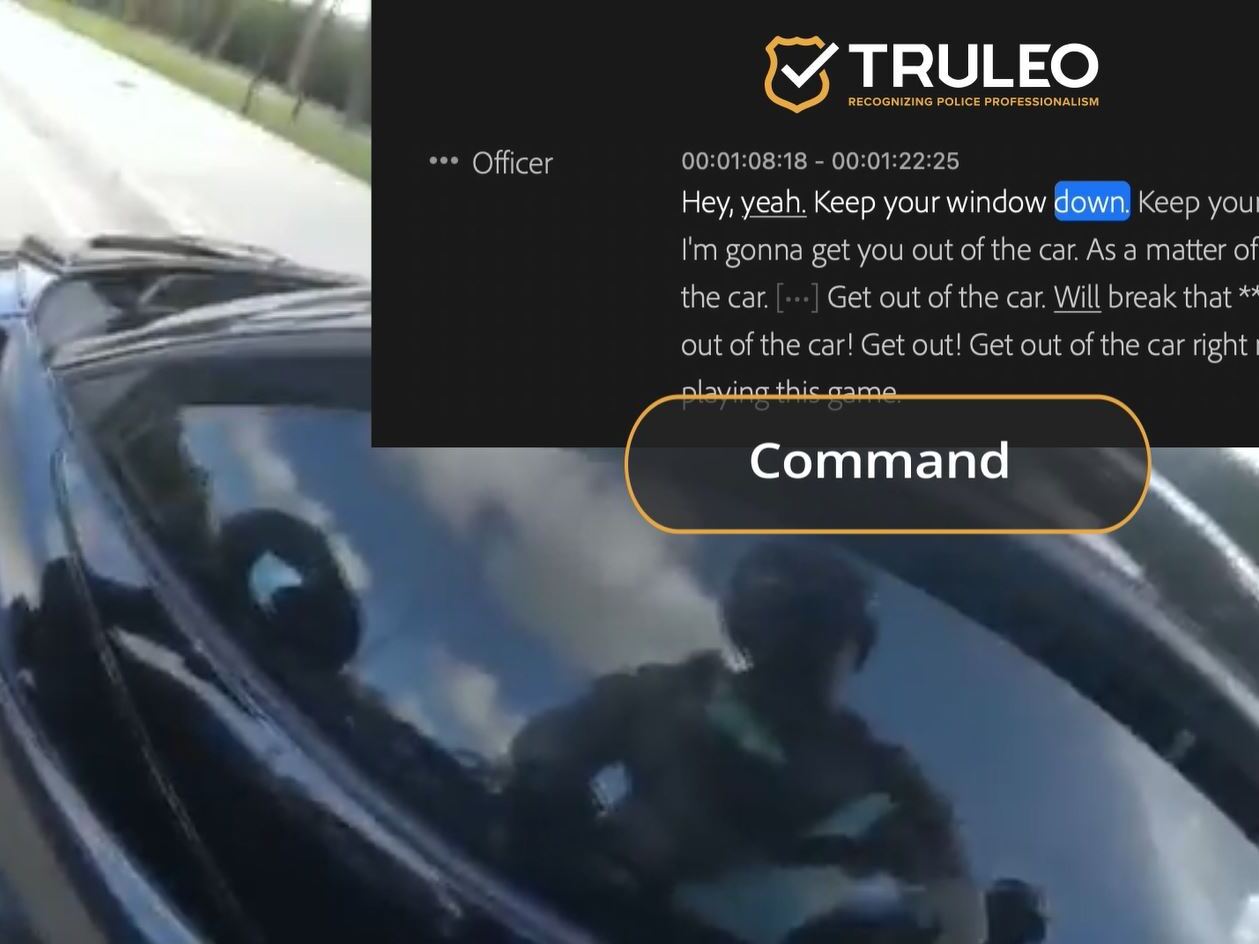 caption: In this screen grab of a Truleo promotional video of the recent traffic stop of NFL player Tyreek Hill by Miami-Dade police, the AI software analyzes speech in body camera footage to assess police conduct during the interaction.   