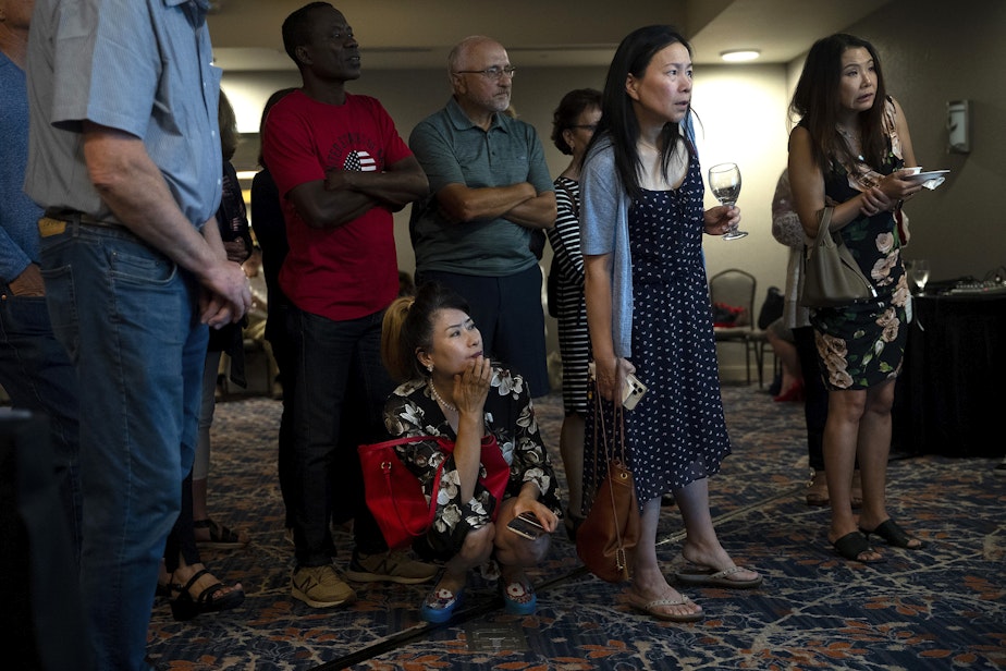 caption: Republican voters gathered to watch as primary election results came in on Tuesday, August 2, 2022, at the Hilton Garden Inn in Issaquah. 