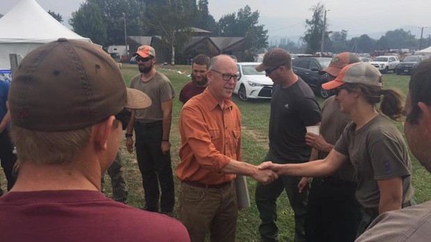 caption: <p>U.S. Rep. Greg Walden of Oregon meeting with firefighters during the Eagle Creek Fire in 2017.</p>