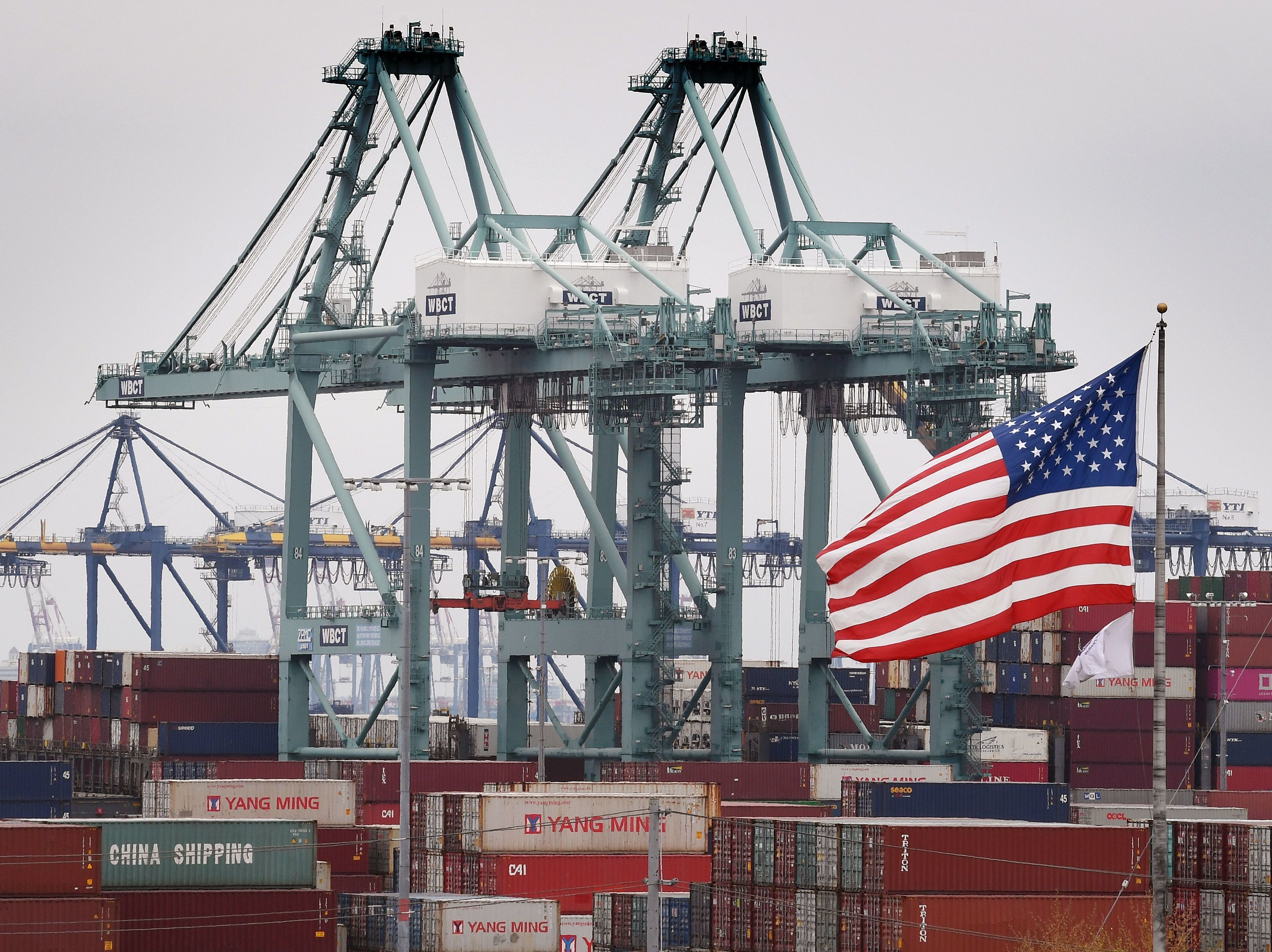caption: Chinese shipping containers are stored at the Port of Los Angeles in Long Beach, Calif. Americans, in bigger numbers than ever, like trade. But they also believe China doesn't play fair in trade.