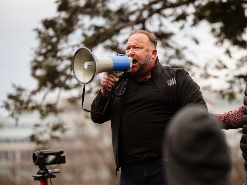 caption: Conspiracy theorist Alex Jones, pictured in Washington last year.